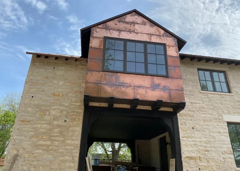 Copper metal panel facade on a stone building for Metal Roof Coating in Oxon Hill